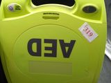 a yellow box with a sticker that says ved on it