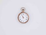 an old pocket watch with roman numerals on a white background