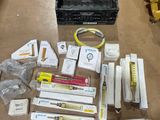 a box of assorted items sitting on the floor