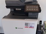a printer that is sitting on top of a table