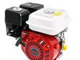 le petit moteur est rouge et blanc sur fond blanc