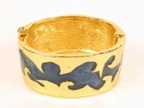 an image of a close up of a gold and blue bracelet