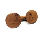 pair of wooden knobs on a white surface with a white background