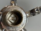 a close up of a metal object on a table