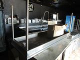 an image of a commercial kitchen with a lot of counter space