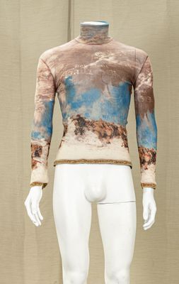 a mannequin with a blue and brown design on it
