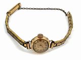 an image of a wrist watch on a chain on a white background