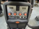 a machine that is sitting on the ground in the garage