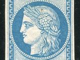 a blue and white stamp with a woman ' s face on it