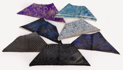 six pieces of blue, purple, and black handkerchiefs on a white surface