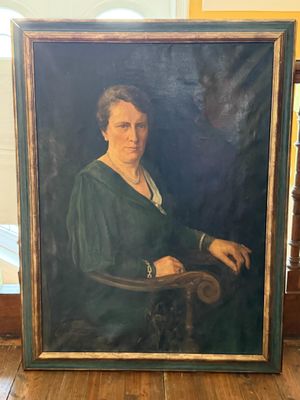 tableau représentant une femme en robe verte, assise sur une chaise