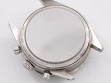 an image of a close up of a watch on a white surface