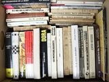 a box full of books sitting on top of a table