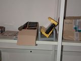 a white shelf with a bunch of items on it