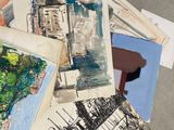 many different types of art work on the floor