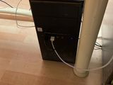 a computer that is sitting on top of a desk