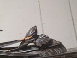 a statue of a bird sitting on top of a table