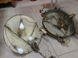 two lamps that are sitting on the floor next to each other