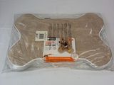 un jouet pour chien en forme d'os, emballé dans du plastique