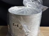 a bag of plastic wrapped in plastic on a wooden table