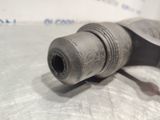 a close up of a metal object on a table