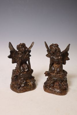 Paire de statue en fonte représentant chérubin agenouillé su…
