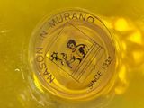 a yellow bowl with a yellow label on it