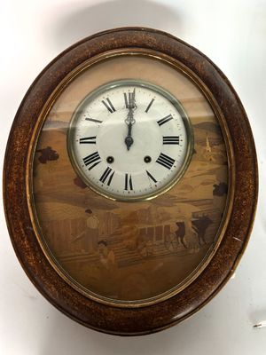 a clock with roman numerals on the face of it