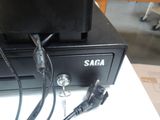a black box with wires attached to it on a table