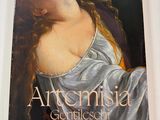 an image of a book with a picture of a woman in a white dress