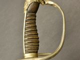 an old sword with a lion head on the end of it
