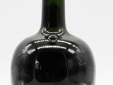a bottle of liquor that is sitting on a table