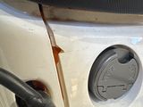 a close up of a car ' s door handle and handlebars