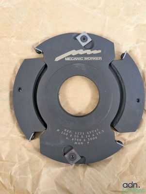 a close up of a circular cutter on a piece of paper