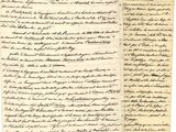 une lettre écrite à l'encre noire sur une feuille de papier
