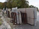 a pile of concrete blocks sitting on the side of the road
