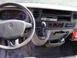 a dashboard of a car with a steering wheel and dash board