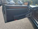 a car door open on the side of the road