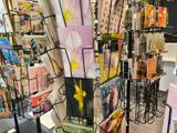 many cards on display in a store with a lot of them