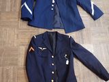 jacket and jacket on the floor next to a jacket on the floor