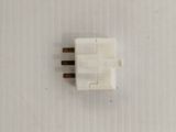 a close up of a small white electrical device on a white surface