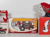many different toy vehicles that are sitting on a table