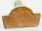 a piece of wood that is sitting on a white surface