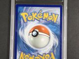 a close up of a pokemon card on a table