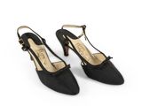 a pair of black high heeled shoes on a white background