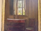 un tableau accroché au mur d'une pièce où se trouvent une table et deux chaises