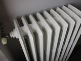 an image of a radiator that is in the corner of a room