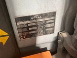 a close up of a machine that is on the ground