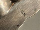 a close up of a metal object on a table
