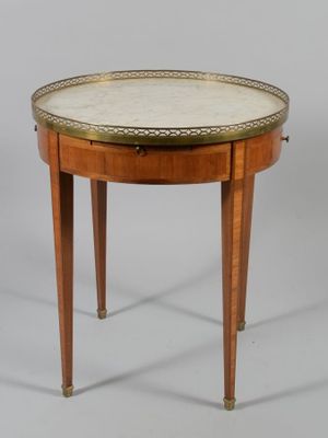 an image of a small table with a marble top and wooden legs